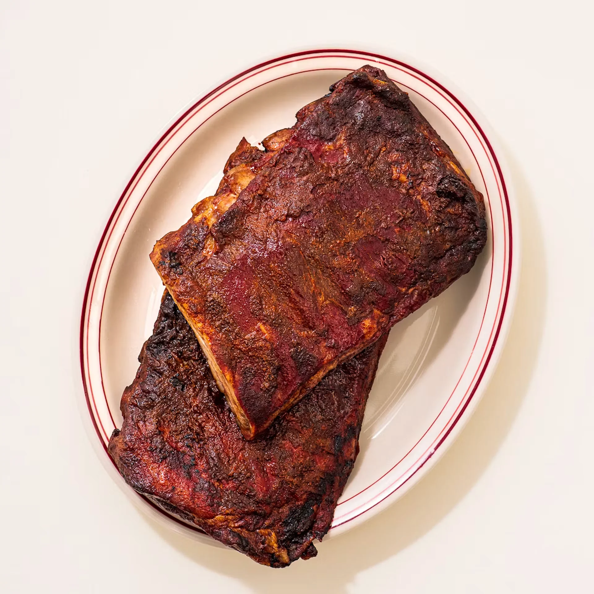 Arthur Bryant’s smoked rib racks on a platter